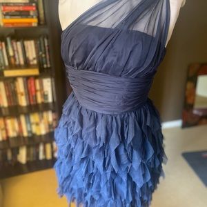 Navy one shoulder cocktail dress with flutter skirt